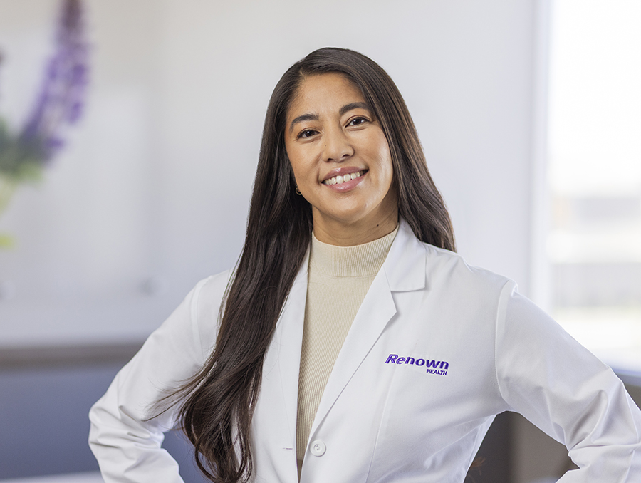 Headshot of Angela Dao in a white coat.