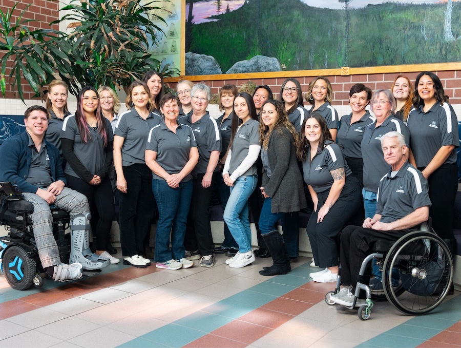 The staff of NCED pose together for a photo.