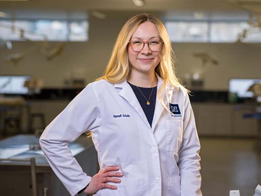 Hannah Schultz in a lab with ultrasound equipment.