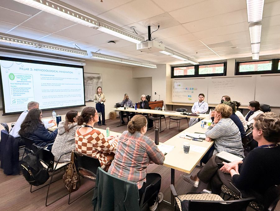 A group of people at a meeting during LGBTQ+ Nursing Summit.
