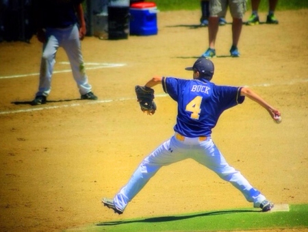 Zack Buck pitching in at a high school game.