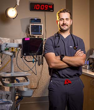 Cameron Shonnard standing in a clinical room.
