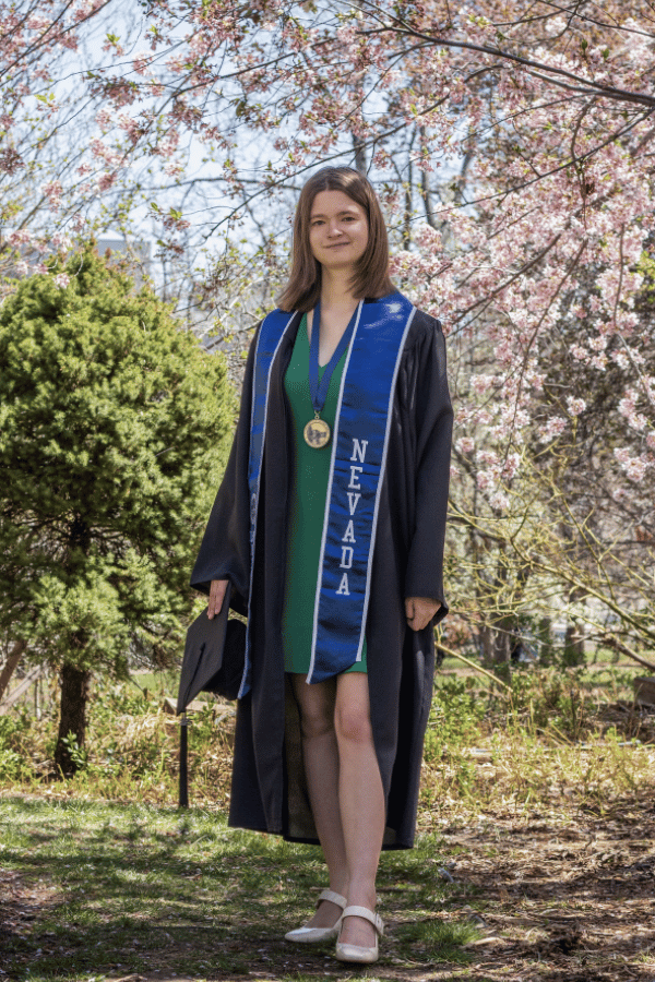 Megan Webb in a graduation gown.