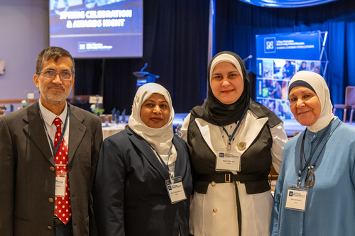 Extension professors Najat Elgeberi and Most Tahera Naznin pose with their family members.