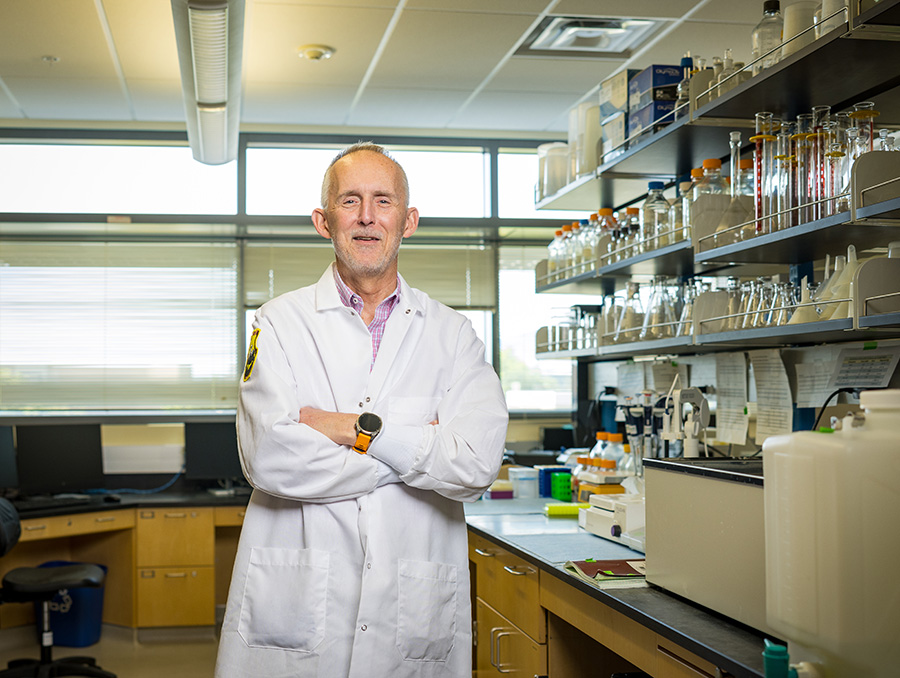Robert Harvey standing in his laboratory.