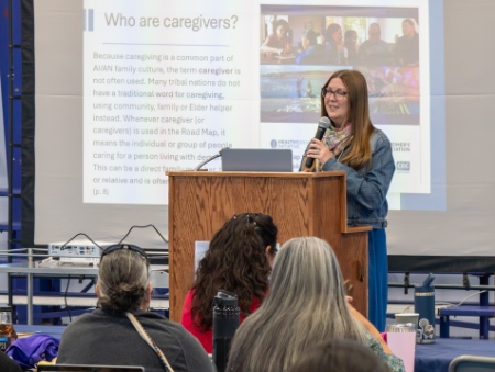 Jennifer Carson, Ph.D., speaking at the 2025 Tribal Summit.