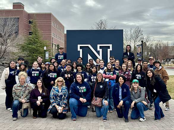 4-H staff and students on campus near the N monument.
