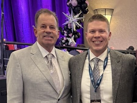 Jake Hargis and Dr. James Lynch attending a party.