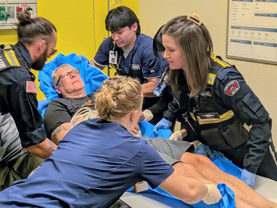 Simulated patient with nursing students and Care Flight team
