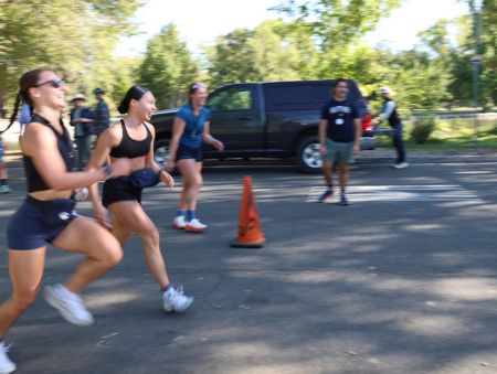Runners crossing the finish line at the NRAP 5RK.