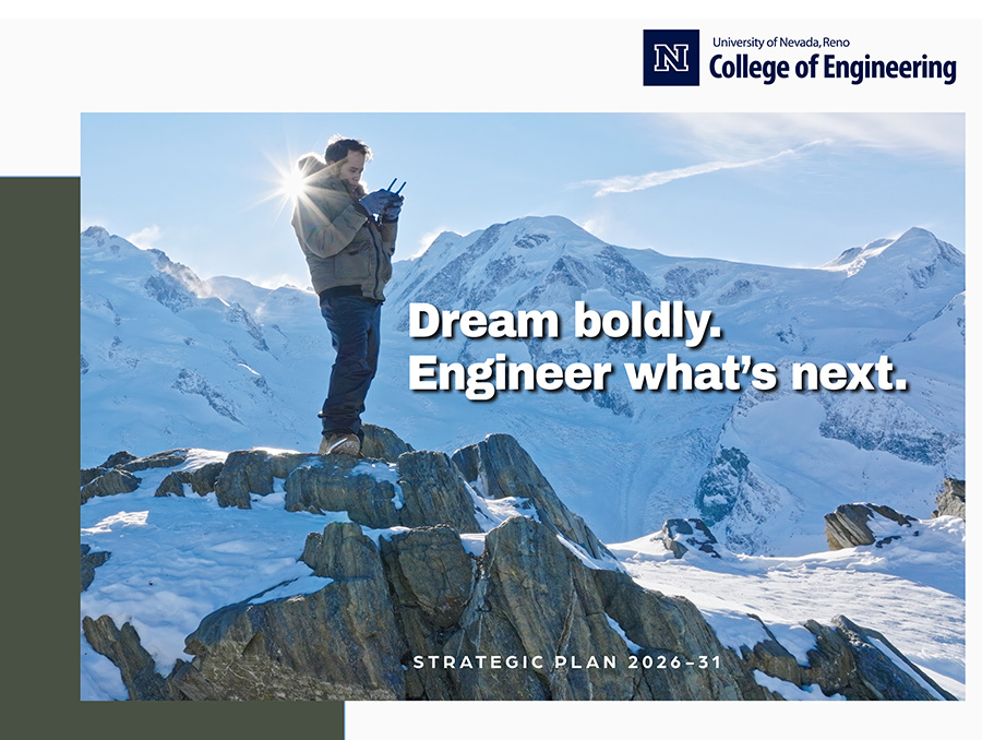 Man standing on a snowy mountaintop looking at an handheld electronic device; words on the page read "Dream boldly. Engineer what's next. Strategic plan 2026-31."
