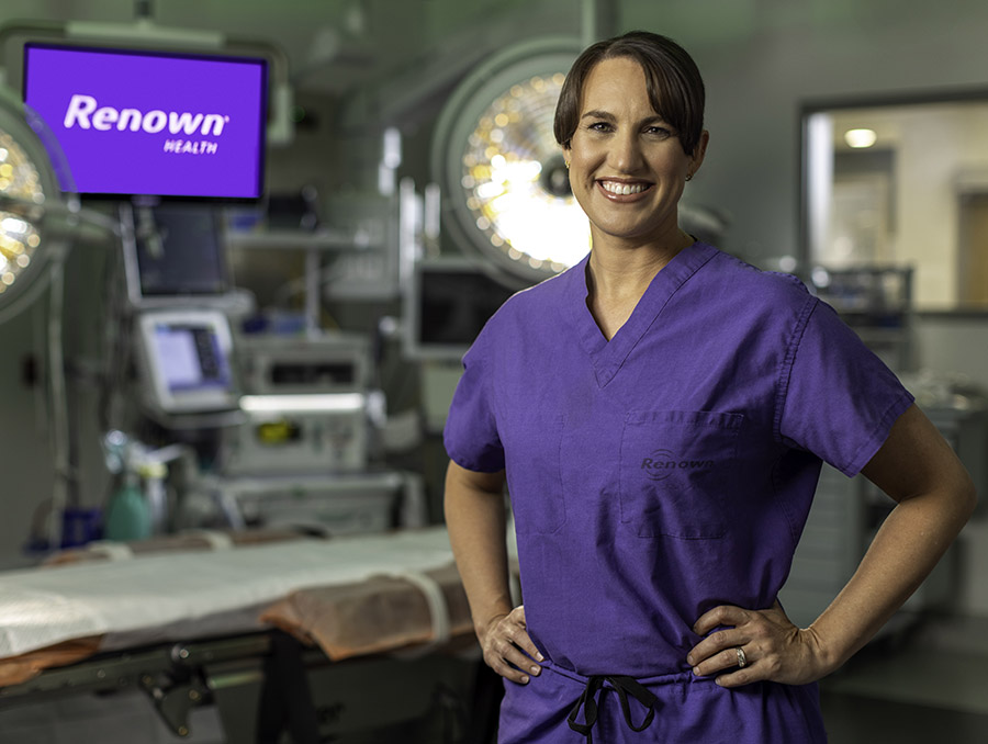 Alicia Gingrich in purple scrubs standing in an operating room at Renown Health.