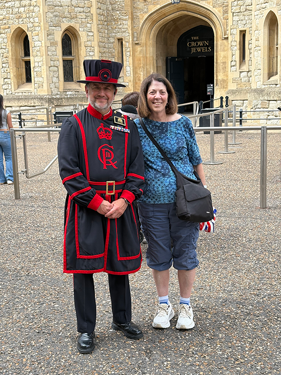 School of Social Work Dean in London with a British Crown Jewels guard.