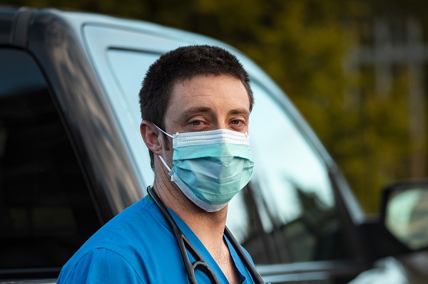 Dr. Sam Dugan looking tired after a day on shift during the coronavirus pandemic