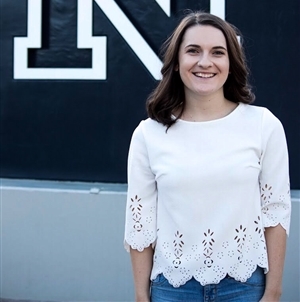 Madeline Purdue standing in front of the block N