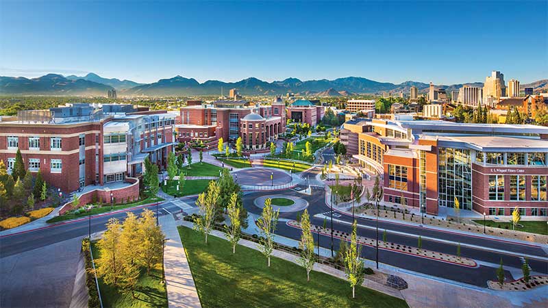 An aerial view of the University of Nevada, Reno campus with looking south with mountains visible in the distance.